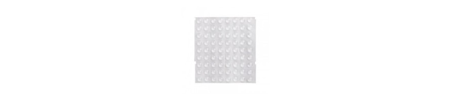 Topes protectores adhesivos