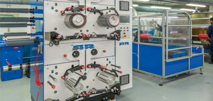 Fustier machine for the manufacture of spools or balls of long-length 3M adhesive tapes